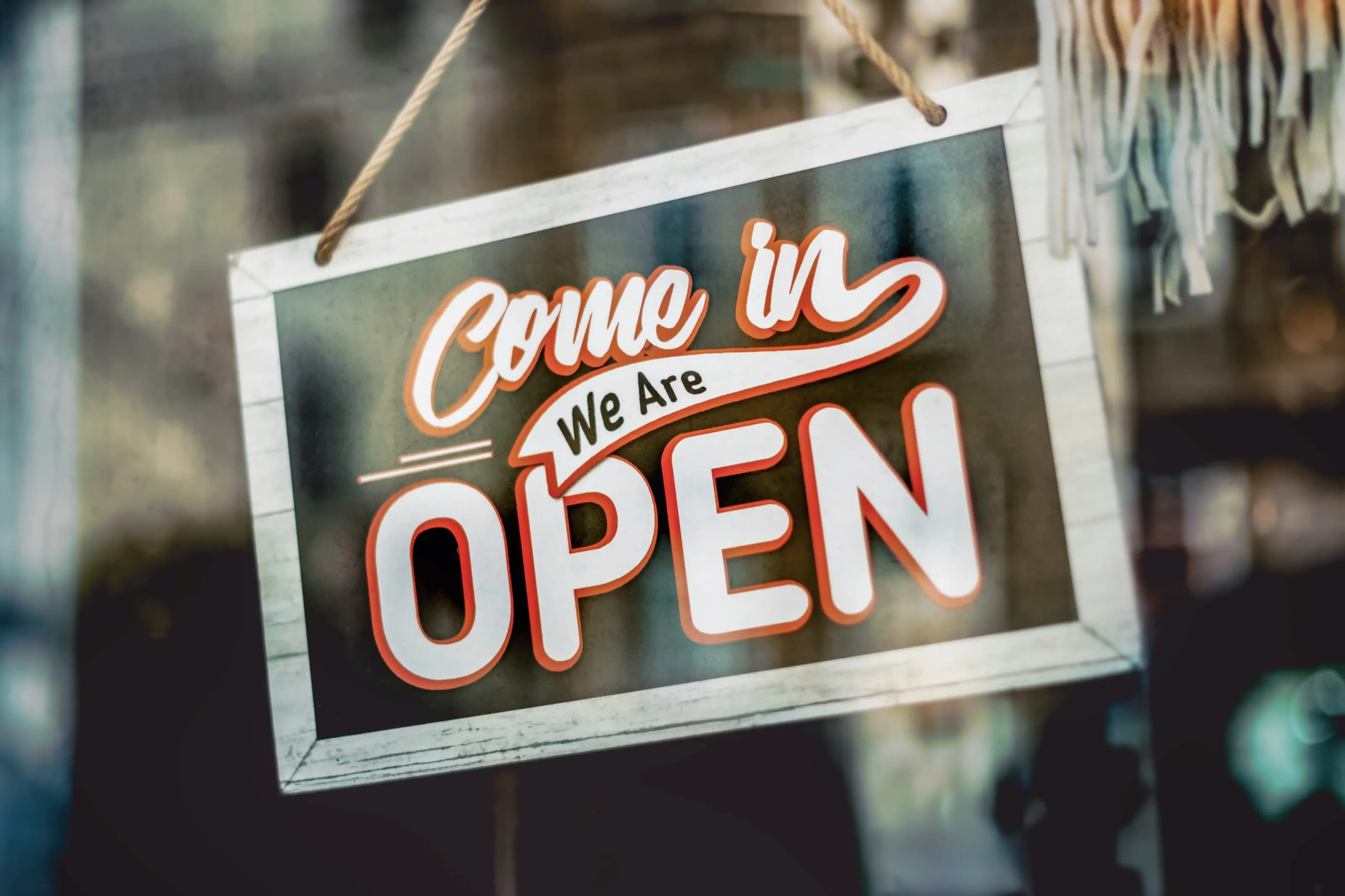 Sign that reads, "Come on in. We're open!"